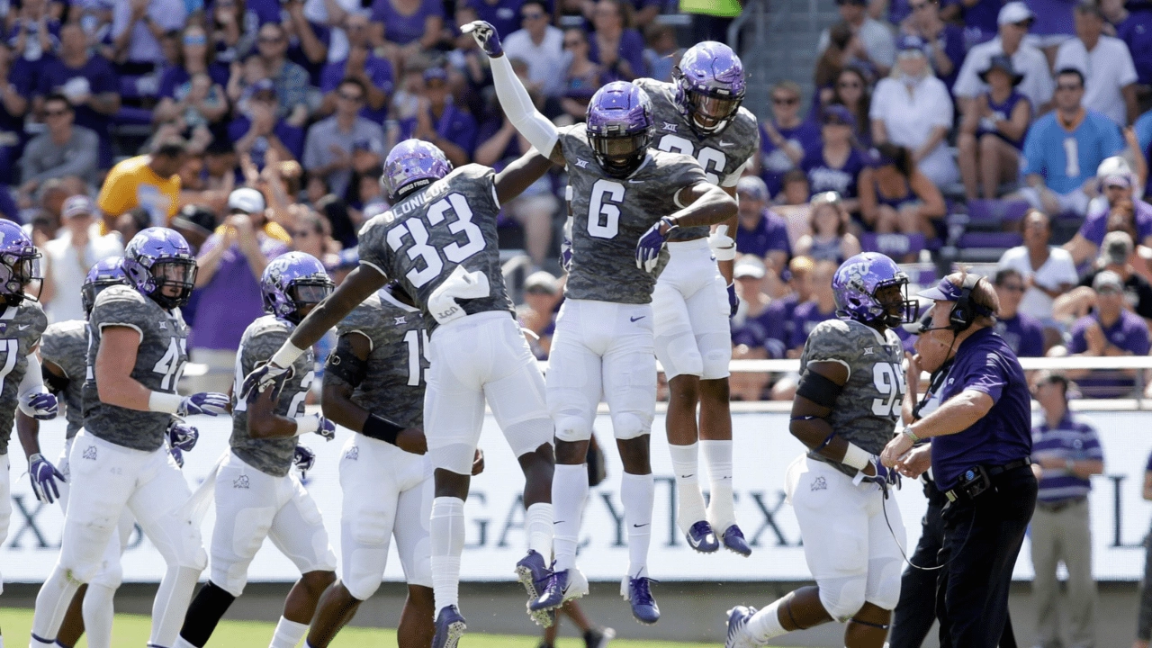 Sep 1, 2018; Fort Worth, TX, USA; TCU Horned Frogs safety Innis Gaines (6) celebrates an interception with his teammates against the Southern University Jaguars at Amon G. Carter Stadium. TCU is a Week 0 contestant in 2026. Mandatory Credit: Tim Heitman-USA TODAY Sports