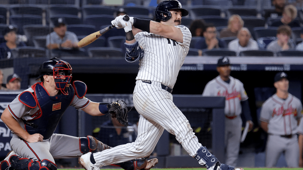 Aug 7, 2026; Bronx, New York, USA; New York Yankees catcher Austin Wells (28) follows through on an RBI double against the Atlanta Braves during the ninth inning at Yankee Stadium. Mandatory Credit: Brad Penner-Imagn Images