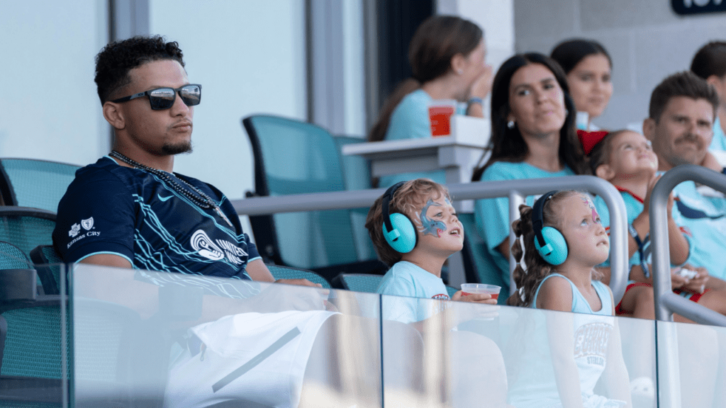 Jul 17, 2026; Kansas City, Missouri, USA; Kansas City Chiefs quarterback Patrick Mahomes watches the KC Current vs. San Diego Wave game with his children at CPKC Stadium. Mandatory Credit: Kylie Graham-Imagn Images
