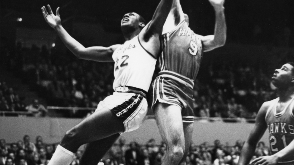 Mar 29, 1961; Los Angeles, CA, USA: FILE PHOTO; Los Angeles Lakers forward Elgin Baylor (22) in action against St. Louis Hawks forward Bob Pettit (9) during the 1961 playoffs at the L.A. Sports Arena. Mandatory Credit: Darryl Norenberg-USA TODAY Sports Network. Don Nelson.