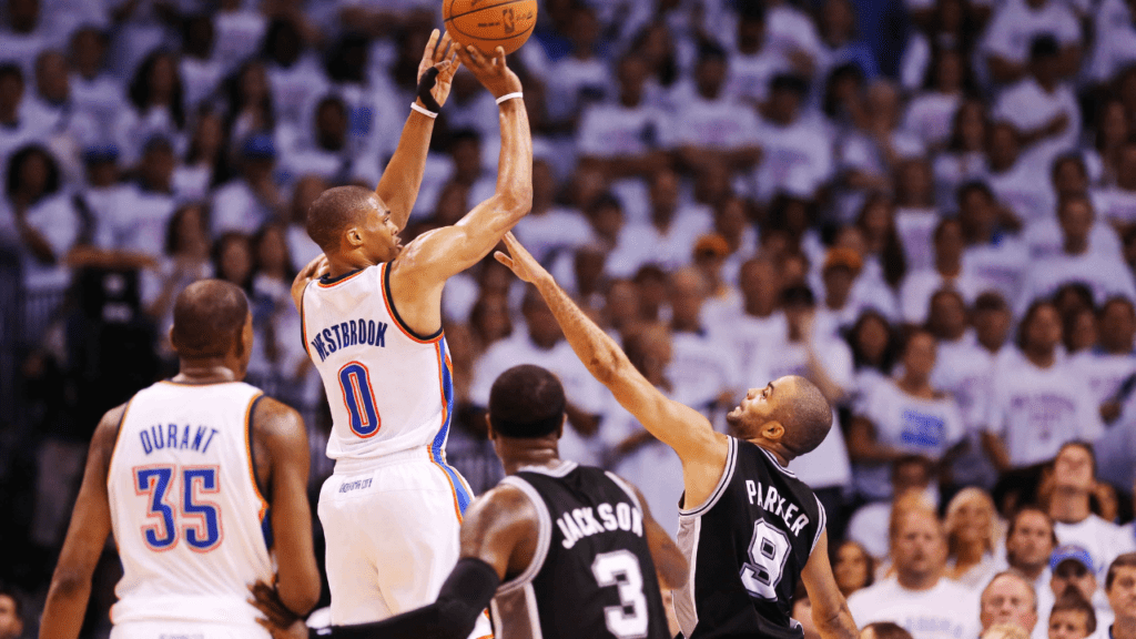 Jun 06, 2012; Oklahoma City, OK, USA; Oklahoma City Thunder point guard Russell Westbrook (0) takes a shot over San Antonio Spurs point guard Tony Parker (9) during game six of the Western Conference finals of the 2012 NBA playoffs at Chesapeake Energy Arena. Oklahoma City won 107-99. Mandatory Credit: Kevin Jairaj-USA TODAY Sports. Kevin Durant.