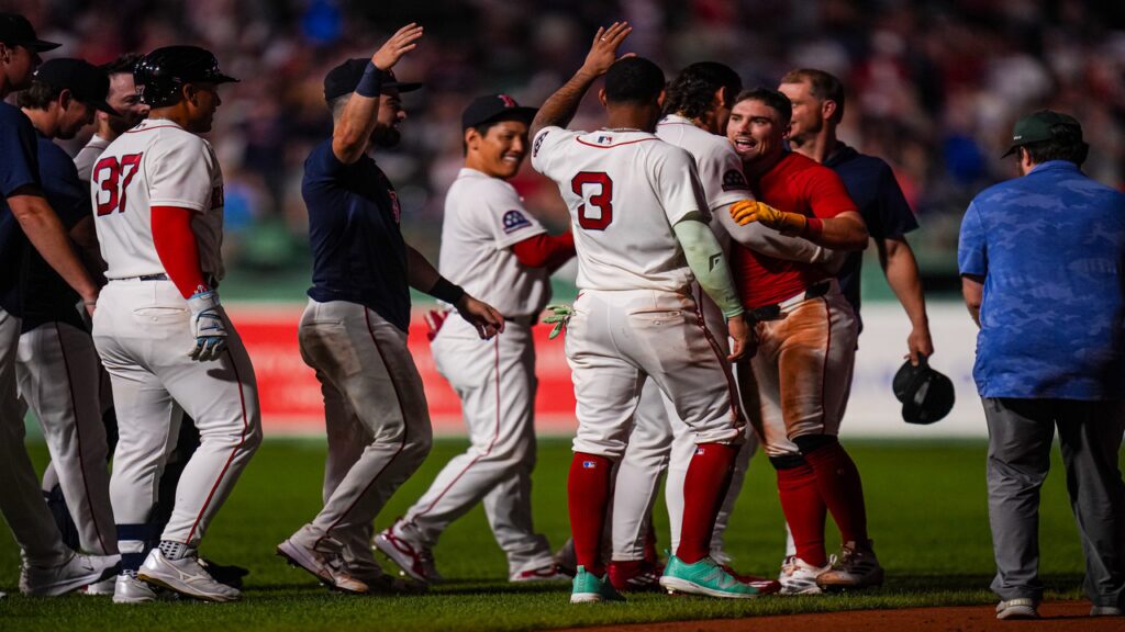 The Red Sox celebrate a walk off win.