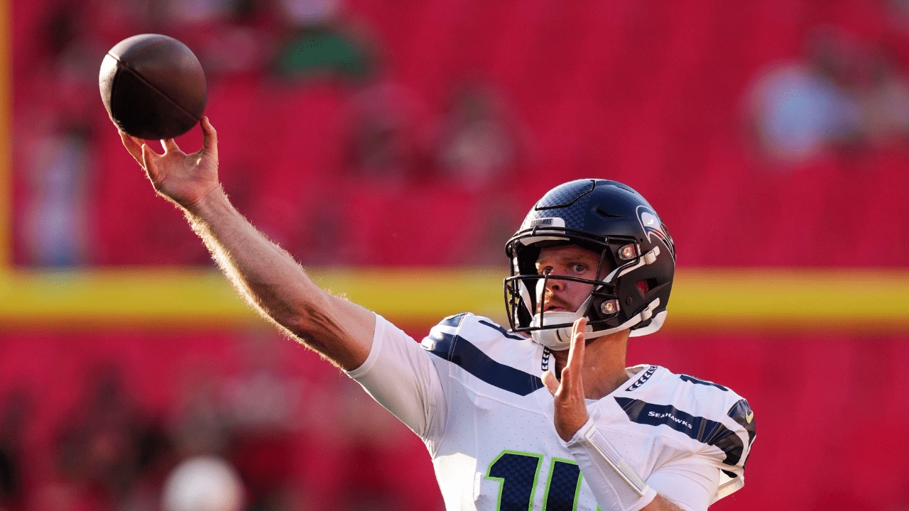 Aug 28, 2026; Kansas City, Missouri, USA; Seattle Seahawks, who are kicking off NFL week 1, quarterback Sam Darnold (14) warms up prior to a game against the Kansas City Chiefs at Arrowhead Stadium. Mandatory Credit: Jay Biggerstaff-Imagn Images