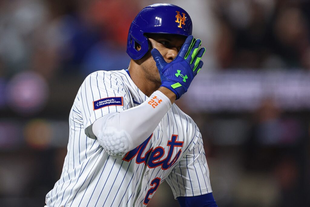 New York Mets right fielder Juan Soto (22) hits a home run during the fifth inning against the San Diego Padres at Citi Field.