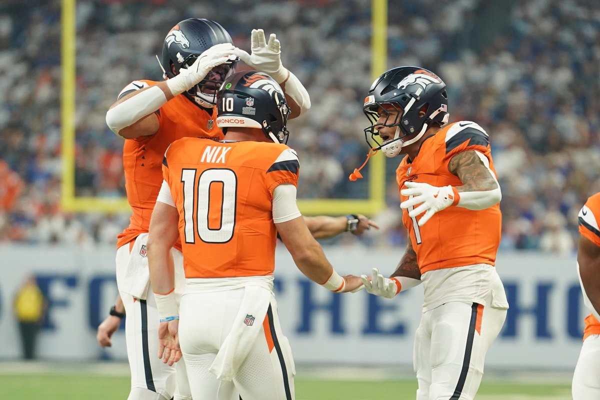The Broncos celebrate after a touchdown.