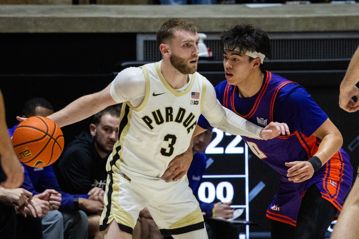 ; West Lafayette, Indiana, USA; Purdue Boilermakers guard Braden Smith (3) dribbles the ball while Evansville Purple Aces guard Bryce Quinet (0) defends in the first half at Mackey Arena. Mandatory Credit: Trevor Ruszkowski-Imagn Images