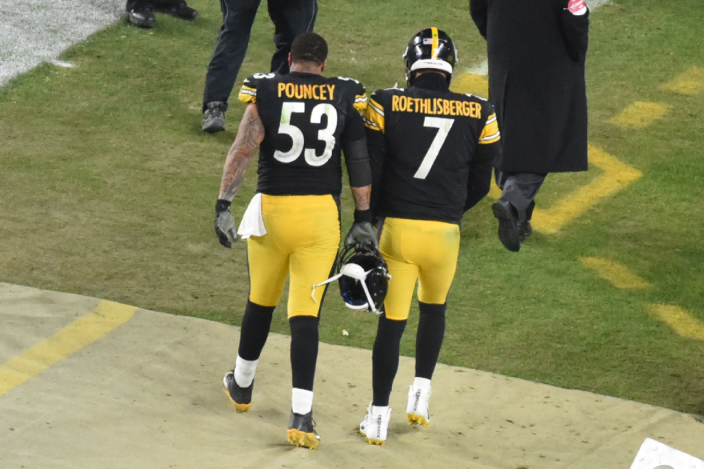 Jan 10, 2021; Pittsburgh, PA, USA; Pittsburgh Steelers quarterback Ben Roethlisberger (7) and center Maurkice Pouncey (53) walk off the field after the AFC Wild Card playoff game against the Cleveland Browns at Heinz Field. Mandatory Credit: Philip G. Pavely-Imagn Images