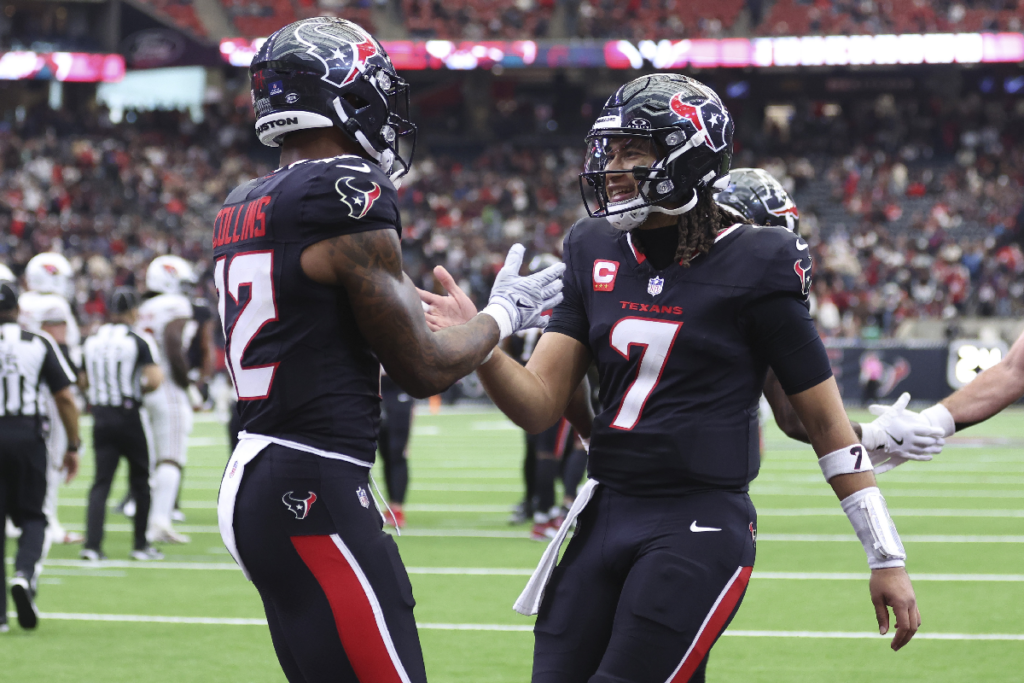 Dec 14, 2025; Houston, Texas, USA; Houston Texans quarterback C.J. Stroud (7) celebrates with wide receiver Nico Collins (12) after a touchdown during the second half against the Arizona Cardinals at NRG Stadium. Mandatory Credit: Troy Taormina-Imagn Images