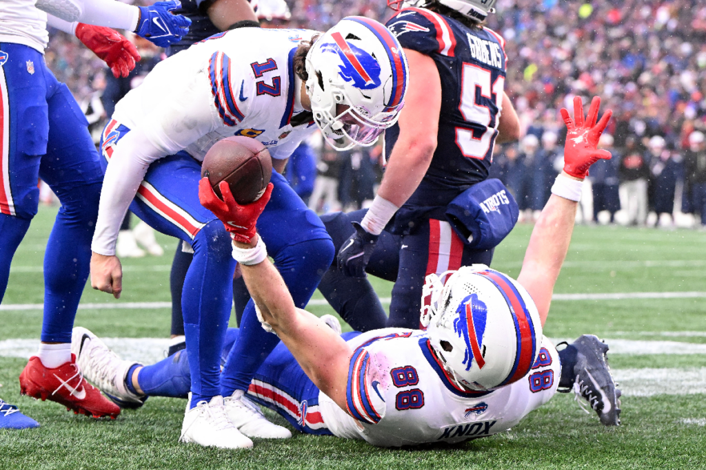 Dec 14, 2025; Foxborough, Massachusetts, USA; Buffalo Bills tight end Dawson Knox (88) celebrates with quarterback Josh Allen (17) after scoring a touchdown against the New England Patriots during the second half at Gillette Stadium. Mandatory Credit: Brian Fluharty-Imagn Images