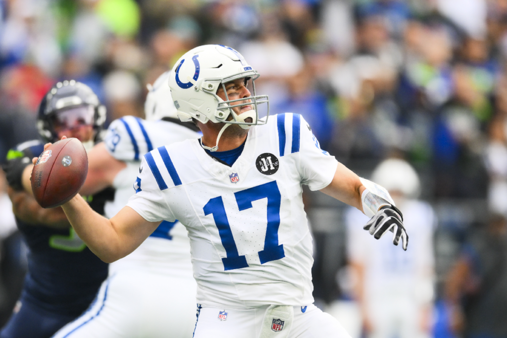 Dec 14, 2025; Seattle, Washington, USA; Indianapolis Colts quarterback Philip Rivers (17) passes against the Seattle Seahawks during the first quarter at Lumen Field. Mandatory Credit: Steven Bisig-Imagn Images