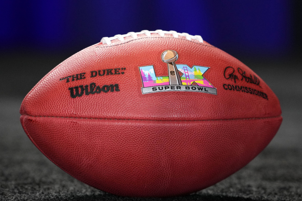 Feb 10, 2025; New Orleans, LA, USA; A Wilson official NFL Duke football with the Super Bowl LX (60) logo at the Super Bowl LIX host committee handoff press conference. Mandatory Credit: Kirby Lee-Imagn Images