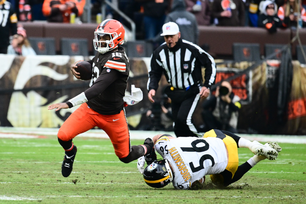 Dec 28, 2025; Cleveland, Ohio, USA; Cleveland Browns quarterback Shedeur Sanders (12) is sacked by Pittsburgh Steelers linebacker Alex Highsmith (56) in the third quarter at Huntington Bank Field. Mandatory Credit: Ken Blaze-Imagn Images