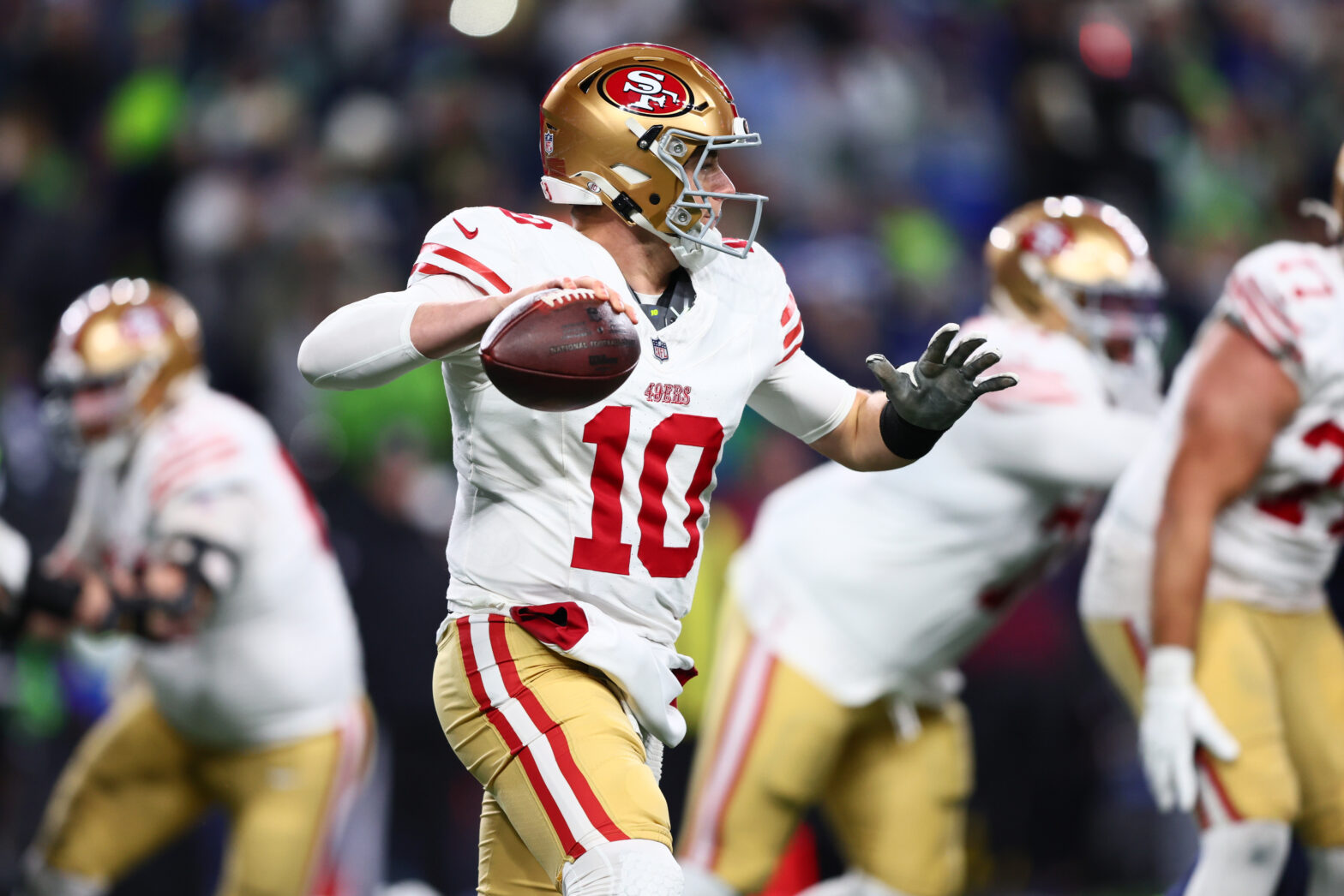 49ers Mac Jones takes the snap