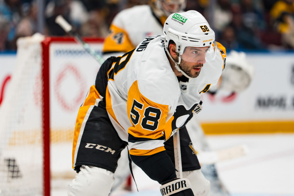 Kris letting stops the puck for the Penguins. 