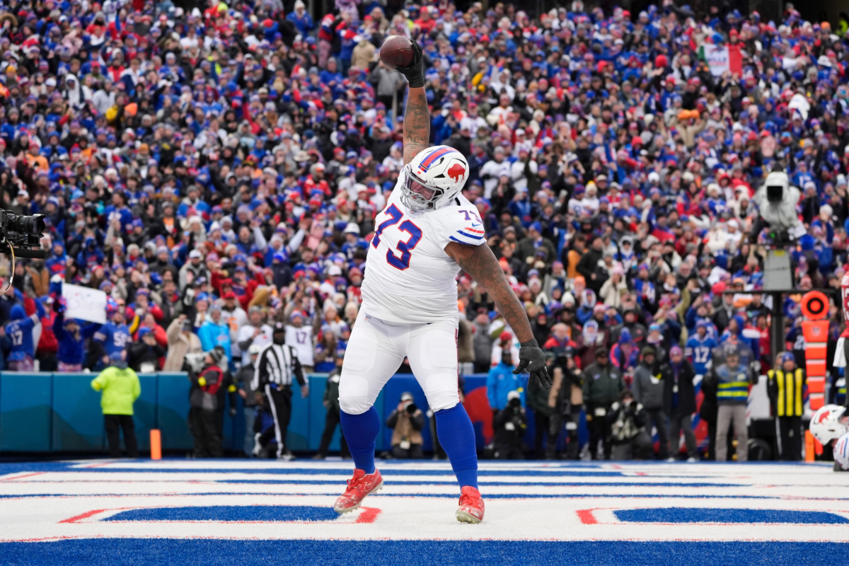 Buffalo Bills' Dion Dawkins celebrating in the end zone