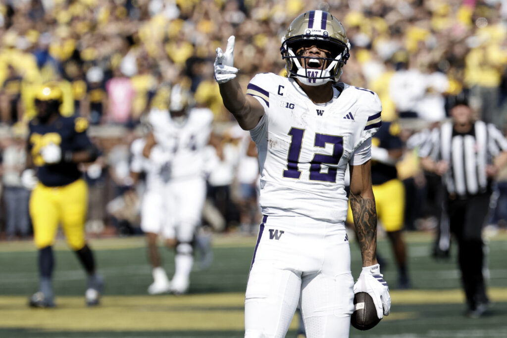 Denzel Boston celebrating after making a play against Michigan