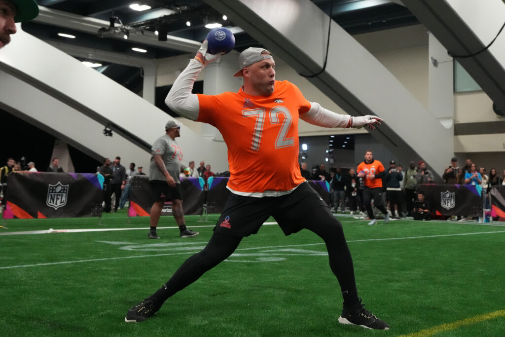 Caption:
Feb 2, 2026; San Francisco, CA, USA; Denver Broncos tackle Garett Bolles participates in dodgeball in the Pro Bowl Games at the NFL Flag Fieldhouse at Moscone Center South Building. Mandatory Credit: Kirby Lee-Imagn Images
