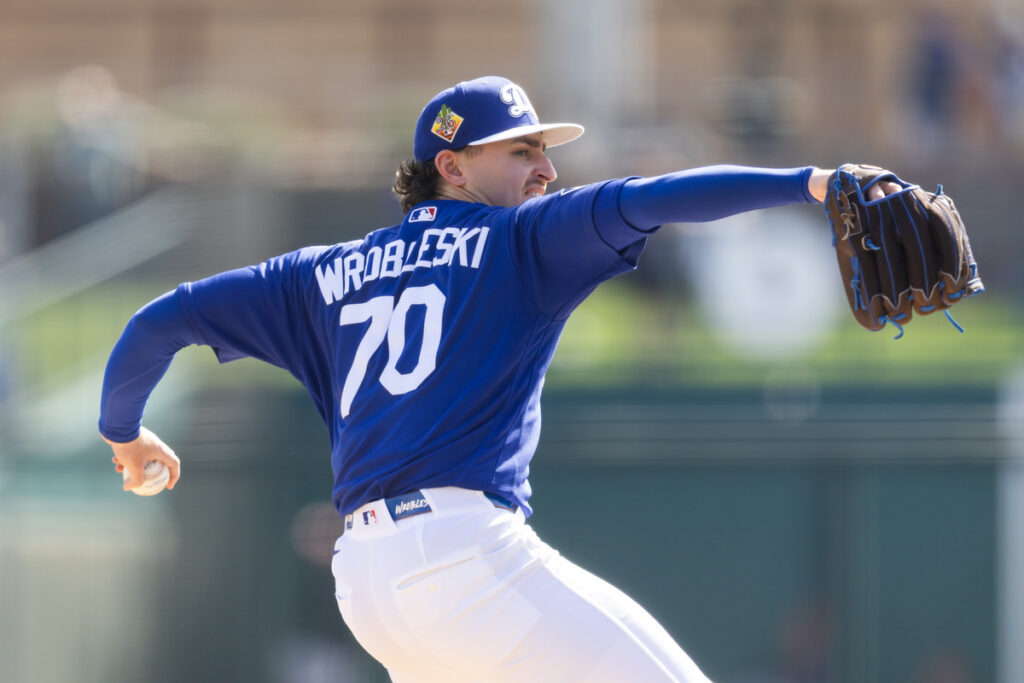 Justin Wrobleski pitches for the Los Angeles Dodgers against the Cleveland Guardians. 