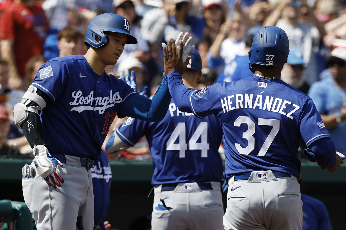 Dodgers players celebrate a home run.