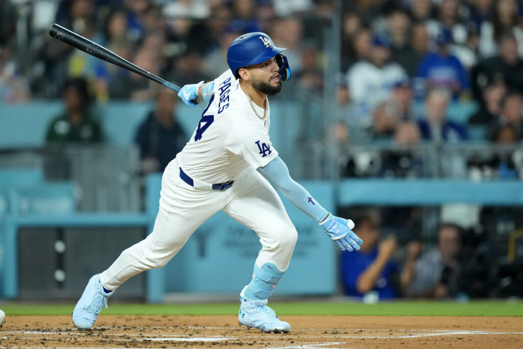 Andy Pages hits a single for the Dodgers.