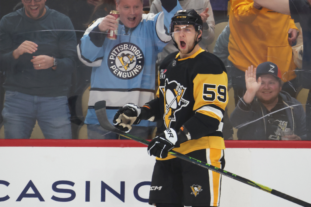 Mar 21, 2026; Pittsburgh, Pennsylvania, USA; Pittsburgh Penguins right wing Egor Chinakhov (59) reacts after scoring a goal against the Winnipeg Jets during the first period at PPG Paints Arena. Mandatory Credit: Charles LeClaire-Imagn Images