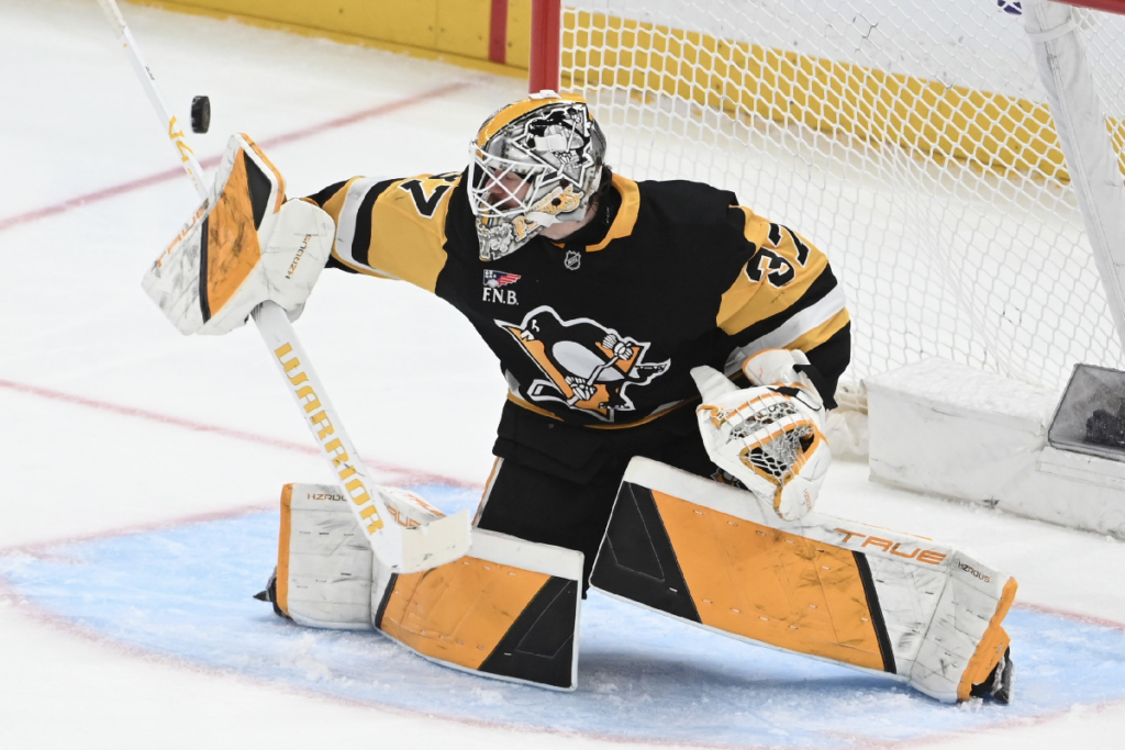 Apr 11, 2026; Pittsburgh, Pennsylvania, USA; Pittsburgh Penguins goalie Arturs Silovs (37) redirects the puck against the Washington Capitals during the second period at PPG Paints Arena. Mandatory Credit: Philip G. Pavely-Imagn Images