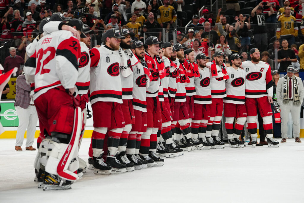 The Carolina Hurricanes celebrate winning the 2026 Stanley Cup.