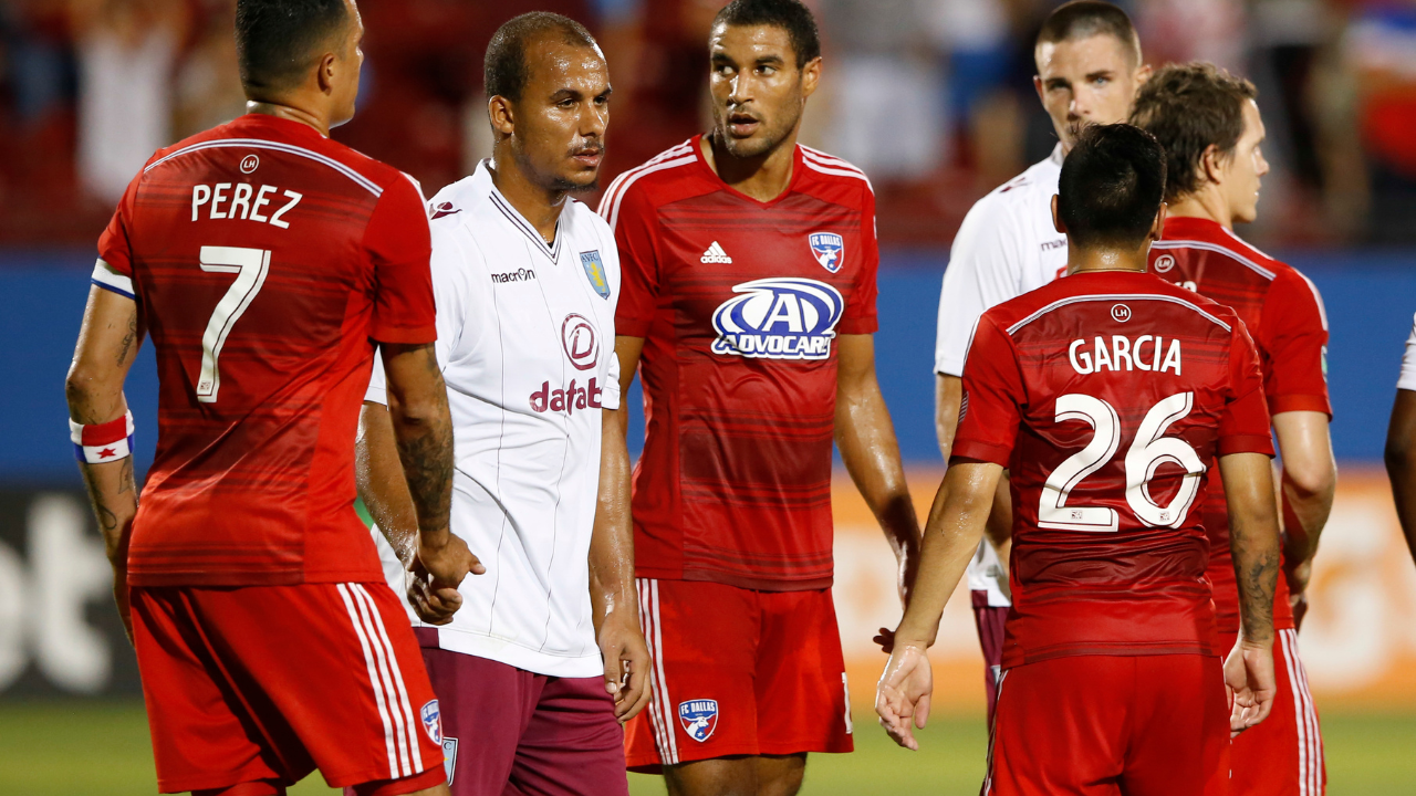 Jul 23, 2014; Frisco, TX, USA; FC Dallas and Aston Villa players shake hands after the game at Toyota Stadium. Aston Villa won 2-0. Mandatory Credit: Kevin Jairaj-USA TODAY Sports
