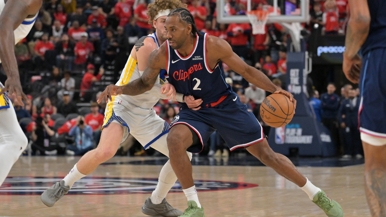 Apr 15, 2026; Inglewood, California, USA; Golden State Warriors guard Brandin Podziemski (2) defends Los Angeles Clippers forward Kawhi Leonard (2) as he drives to the basket in the first half during the play-in rounds of the 2026 NBA Playoffs at Intuit Dome. Mandatory Credit: Jayne Kamin-Oncea-Imagn Images