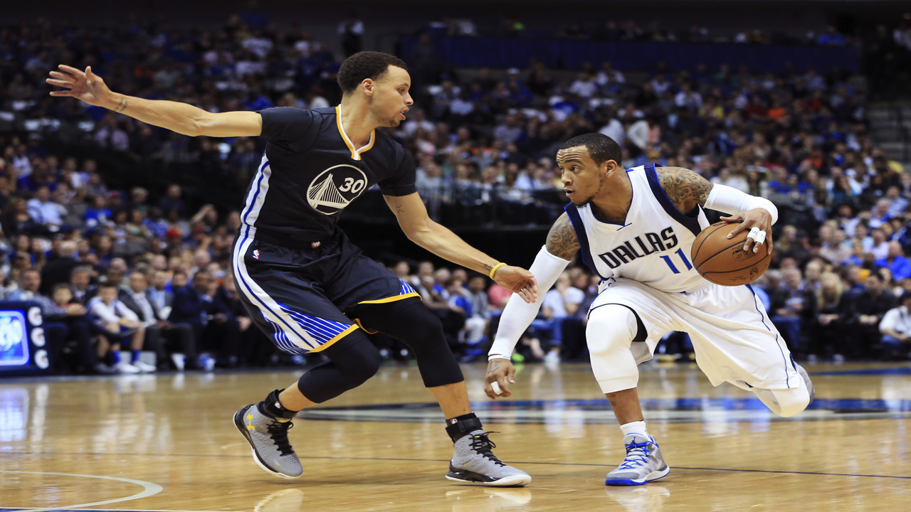 Steph Curry guards Monta Ellis.