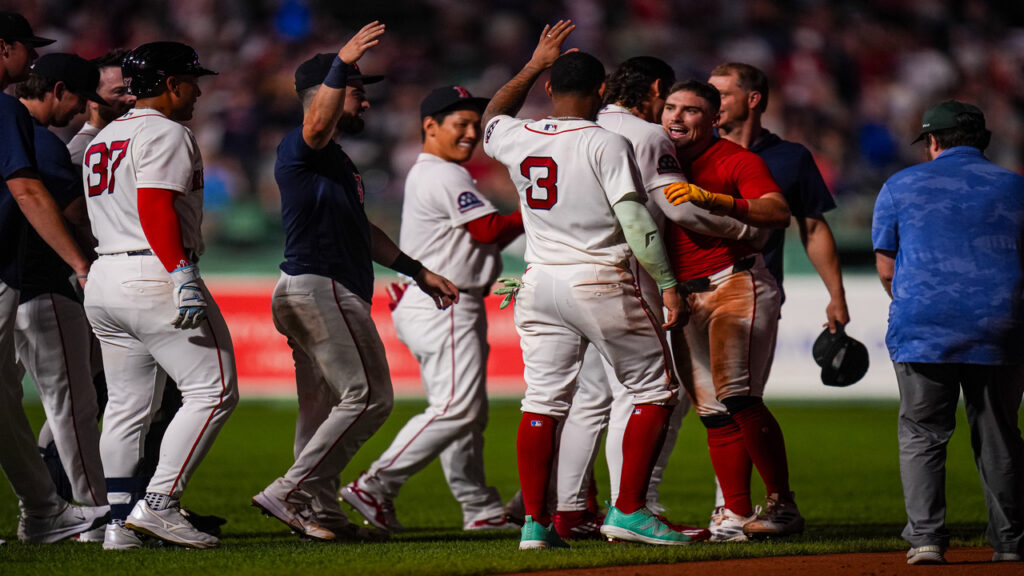The Red Sox celebrate a walk off win.