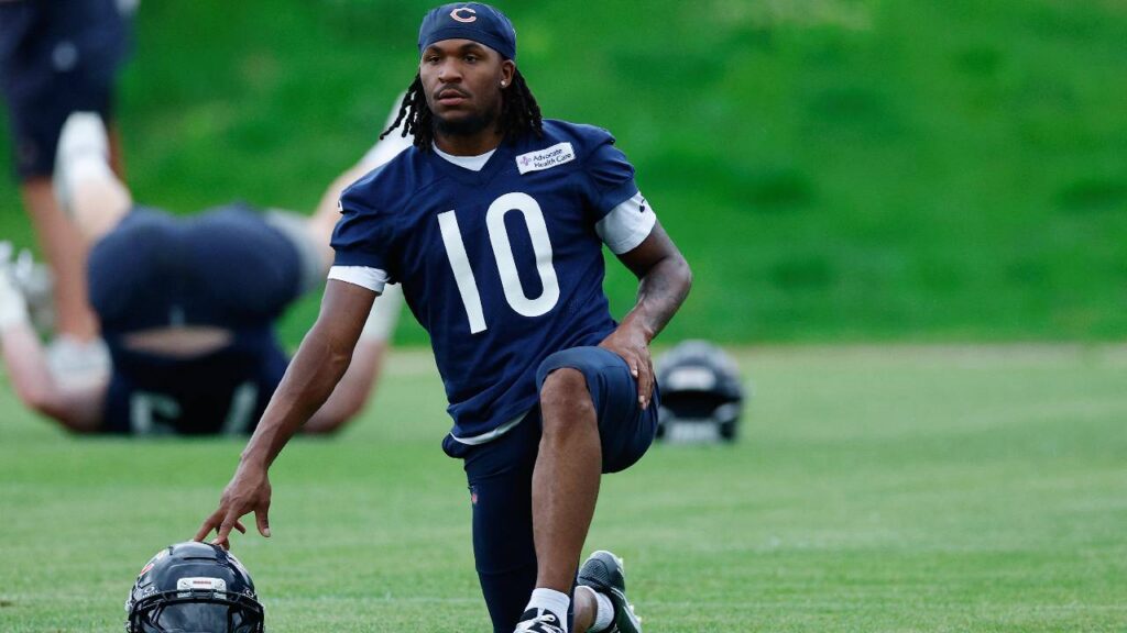 Chicago Bears wide receiver Luther Burden III (10) stretches during Minicamp at Halas Hall.
