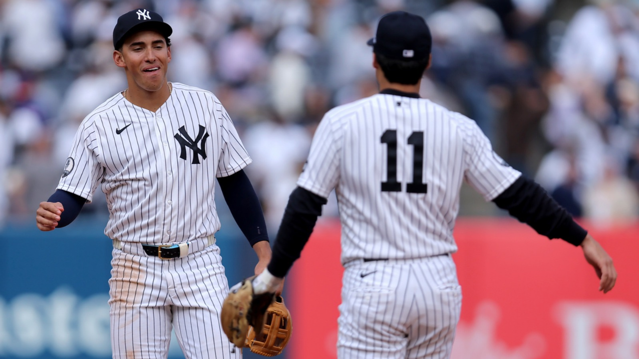 Sep 22, 2026; Bronx, New York, USA; New York Yankees shortstop George Lombard Jr. (96) and second baseman Anthony Volpe (11) celebrate after defeating the Tampa Bay Rays at Yankee Stadium. Mandatory Credit: Brad Penner-Imagn Images