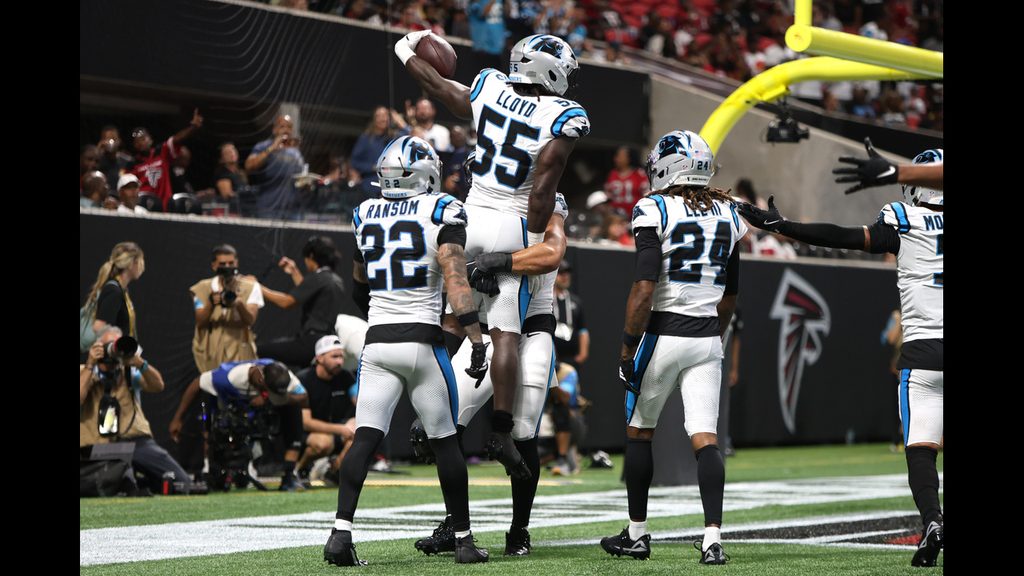Offseason addition Devin Lloyd celebrates after a pick-six against division rival Atlanta Falcons
